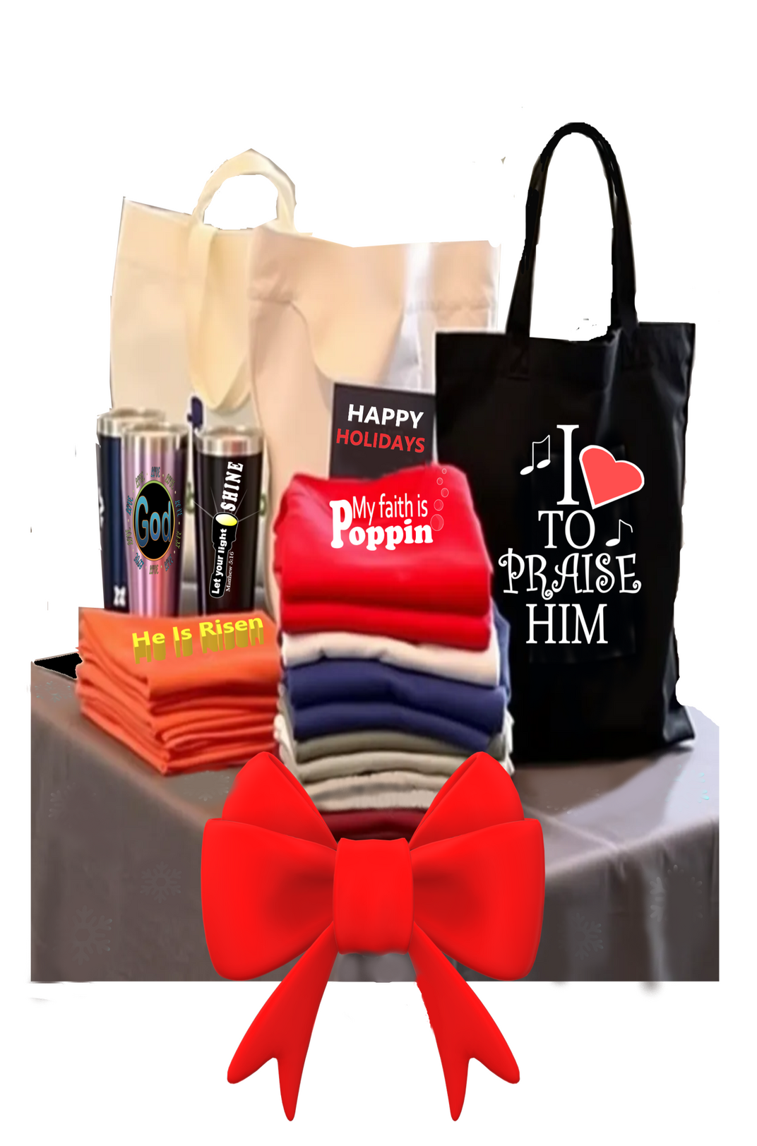 features a table full of Christian T-shirts, tote bags, and Tumbler's.